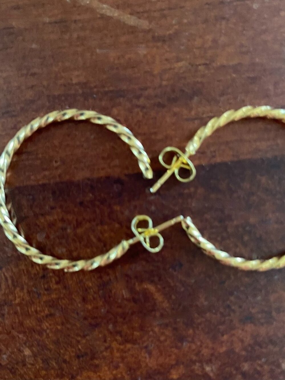 Bundle 3/$12.  Gold Tone Twist Hoop Earrings